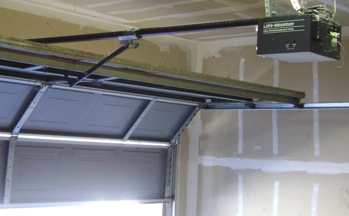 Garage door opener and track, the kind of setup Ascent Garage Door repairs and installs